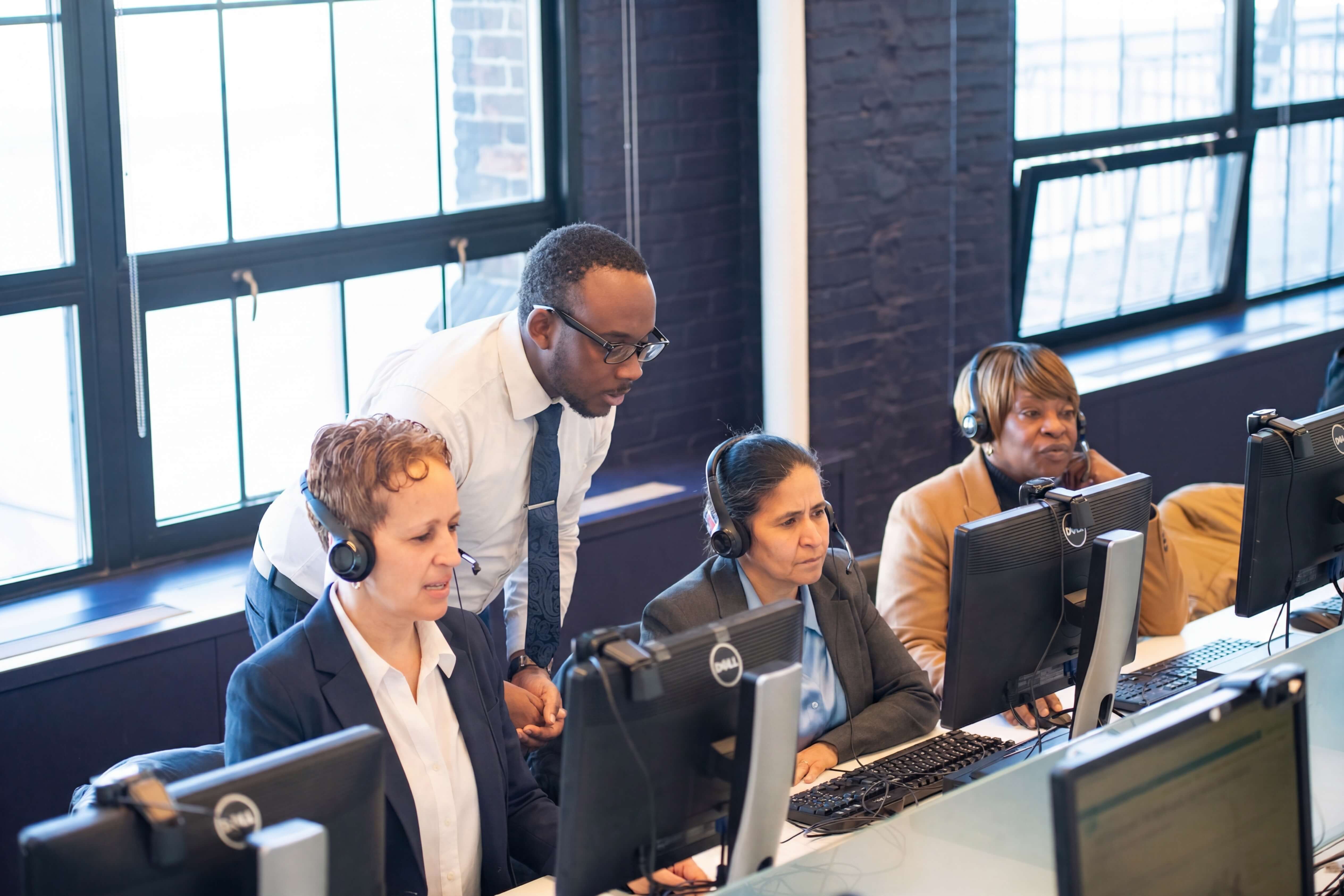 Team working at computer workstations