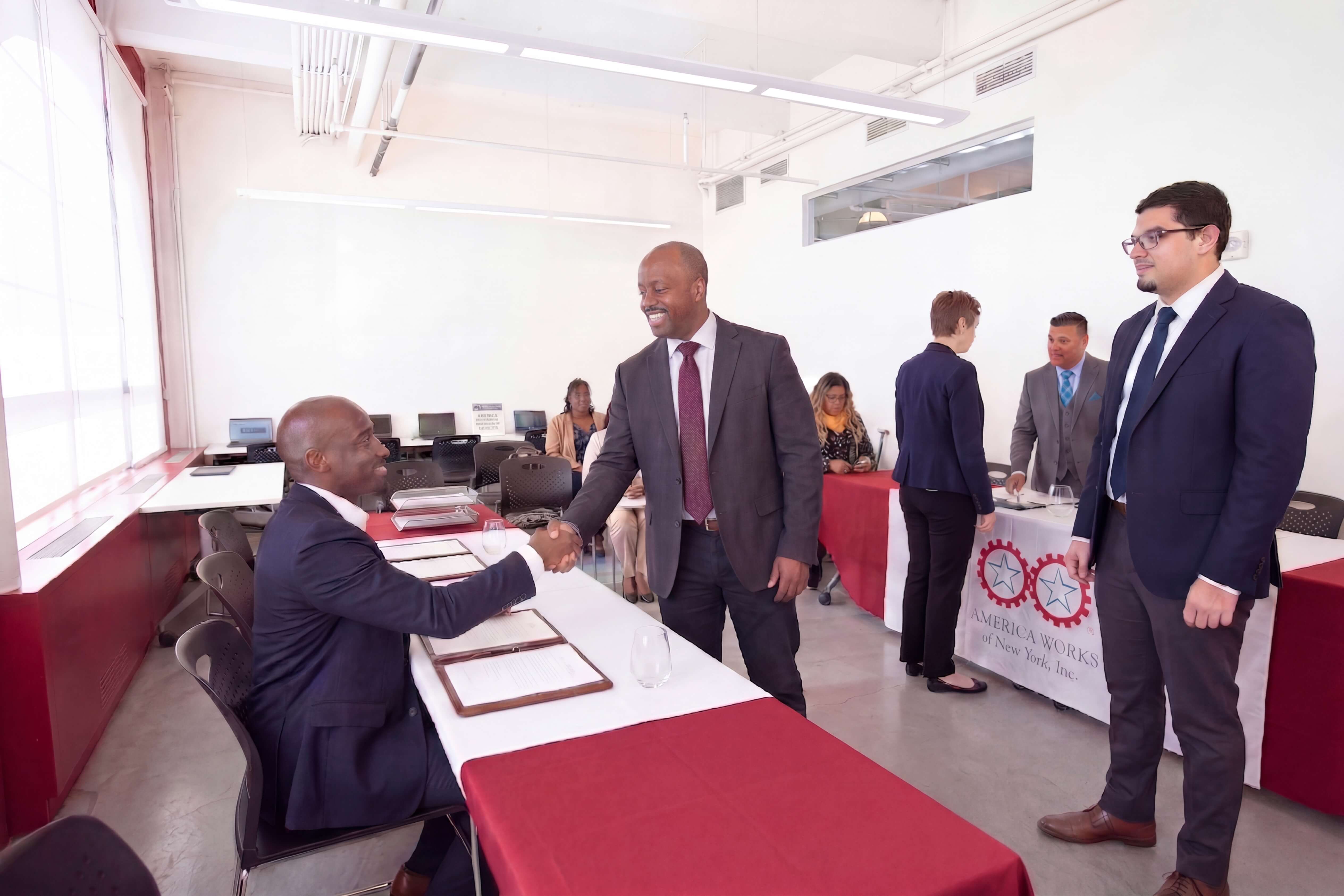 Jobseeker meeting employer at hiring event